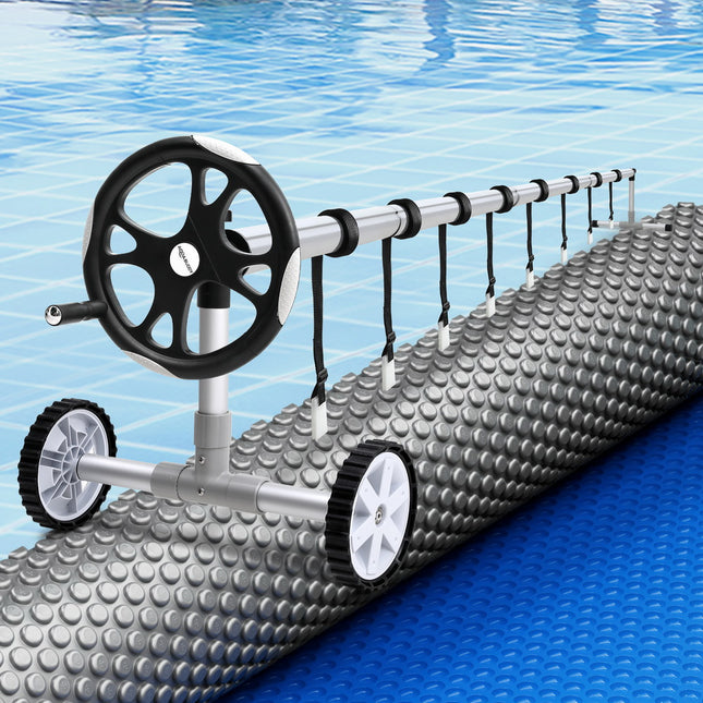 Aqua Buddy Pool Cover 600 Micron 11x6.2m w/ Roller 6.55m Swimming Pools Solar Blanket.