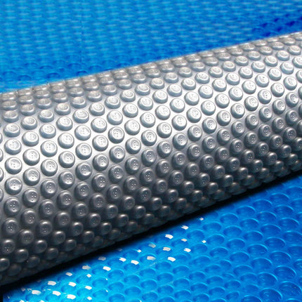 Aqua Buddy Pool Cover 500 Micron 7x4m Swimming Pool Solar Blanket Blue Silver.