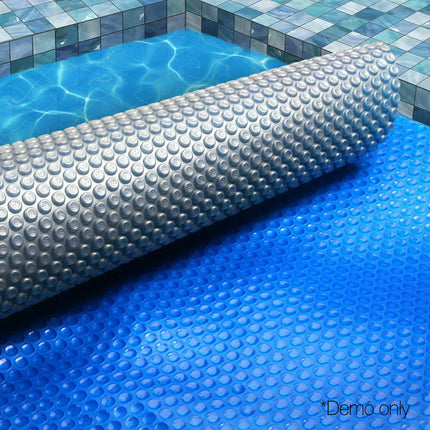 Aqua Buddy Pool Cover 500 Micron 7x4m Swimming Pool Solar Blanket Blue Silver.