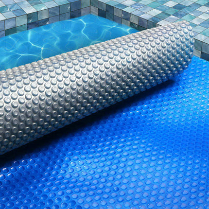 Aqua Buddy Pool Cover 500 Micron 7x4m Swimming Pool Solar Blanket Blue Silver.