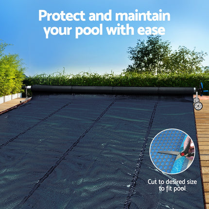 Aqua Buddy Pool Cover 7x4m 600 Micron w/ Roller 5.55m Black Solar Blanket.