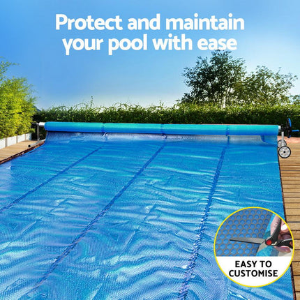 Aqua Buddy Pool Cover 600 Micron Solar Heat 9.5x5m Blanket w/ 5.55m Roller Blue.