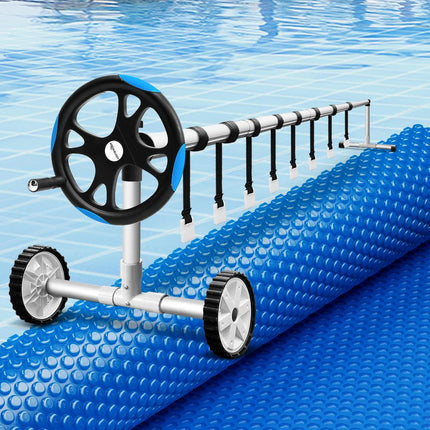 Aqua Buddy Pool Cover 600 Micron Solar Heat 9.5x5m Blanket w/ 5.55m Roller Blue.