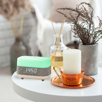 Laser Ambient Diffuser Clock Radio with Bluetooth Speaker & Light.