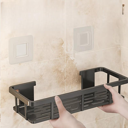 Black Wall-Mounted Storage Shelf - Heavy-Duty Plastic, No-Drill Adhesive Installation, Space-Saving Bathroom and Kitchen Organizer.