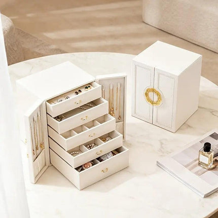 Pink  1 Large Faux Leather Jewelry Storage Box with 5 Drawers and Gold Handles - An elegant rectangular storage space for rings, necklaces, bracelets, earrings, and watches - Features soft fabric lining, side door design, textured surface finish - Luxury.