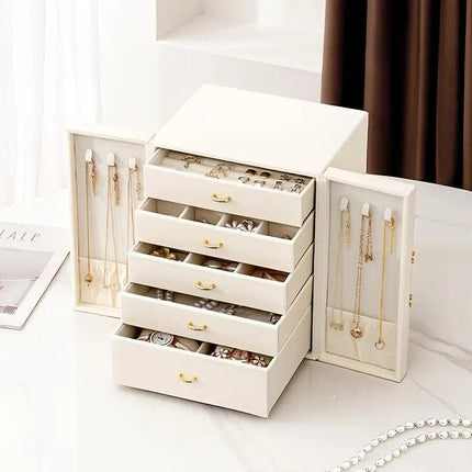 Pink  1 Large Faux Leather Jewelry Storage Box with 5 Drawers and Gold Handles - An elegant rectangular storage space for rings, necklaces, bracelets, earrings, and watches - Features soft fabric lining, side door design, textured surface finish - Luxury.