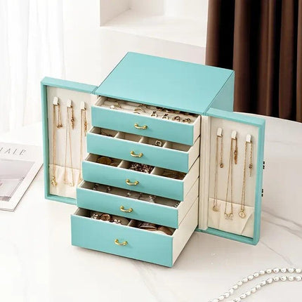 Pink  1 Large Faux Leather Jewelry Storage Box with 5 Drawers and Gold Handles - An elegant rectangular storage space for rings, necklaces, bracelets, earrings, and watches - Features soft fabric lining, side door design, textured surface finish - Luxury.