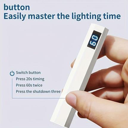A compact portable gel nail polish lamp with a digital display — this wireless lamp lights up quickly and is perfect for home nail salons and travel..