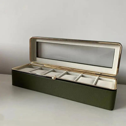Luxury transparent-lid watch box with 6 fabric-lined compartments, portable and shockproof design, suitable for both men and women. Ideal for home, travel, or gifting—a refined storage solution for fine watches and jewelry. (Black).