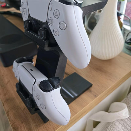 WHITE 3-in-1 PS5 and Xbox Controller Stand – Compatible with PlayStation 5/Xbox Consoles. A gaming desktop organizer with a headphone hanger, non-charging base that holds 2 controllers and headphones. Space-saving white/black console accessory..