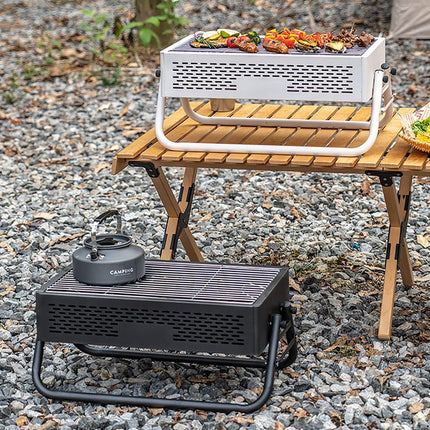 Portable Charcoal Grill with Foldable Legs & Stainless Steel Grate – Compact Outdoor BBQ for Camping, Picnics & Backyard Gatherings (Gray).