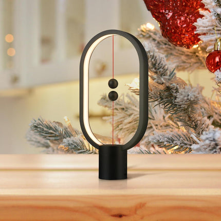 Black Magnetic Balance LED Table Lamp: USB-Powered, Dimmable Eye-Care Light with Award-Winning Design for Australian Homes & Offices.