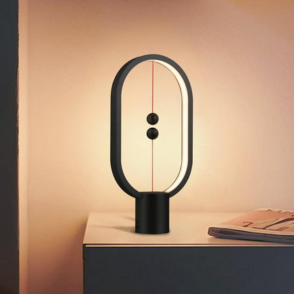 Black Magnetic Balance LED Table Lamp: USB-Powered, Dimmable Eye-Care Light with Award-Winning Design for Australian Homes & Offices.