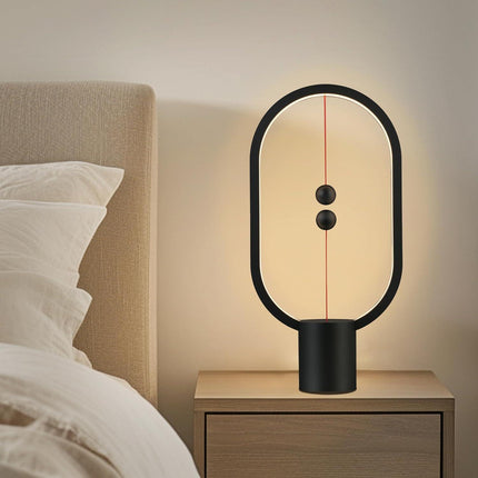 Black Magnetic Balance LED Table Lamp: USB-Powered, Dimmable Eye-Care Light with Award-Winning Design for Australian Homes & Offices.
