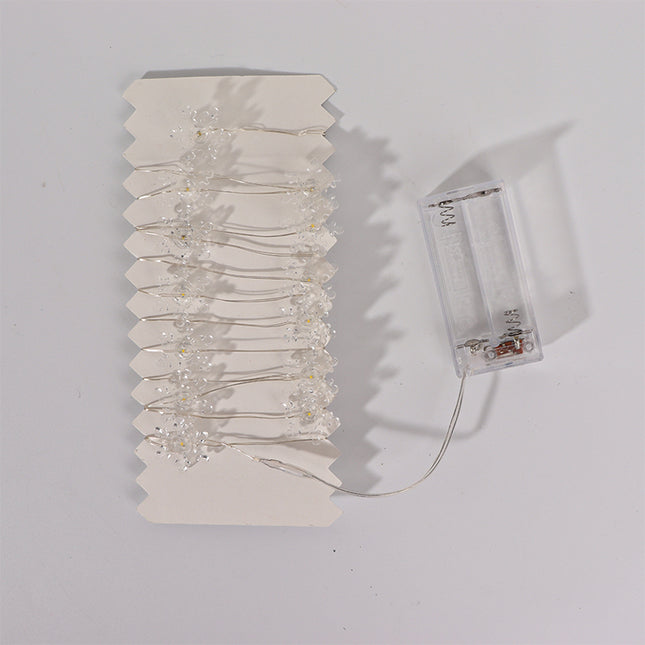2m 20-LED Christmas Snowflake String Lights, Warm White, Battery Powered (2 x AA Batteries Required).
