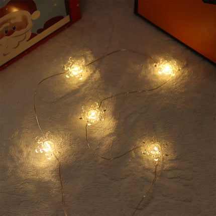 2m 20-LED Christmas Snowflake String Lights, Warm White, Battery Powered (2 x AA Batteries Required).