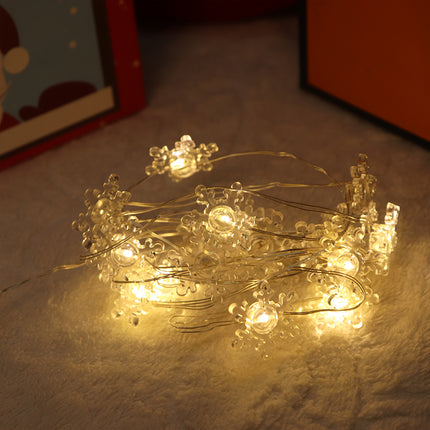 2m 20-LED Christmas Snowflake String Lights, Warm White, Battery Powered (2 x AA Batteries Required).