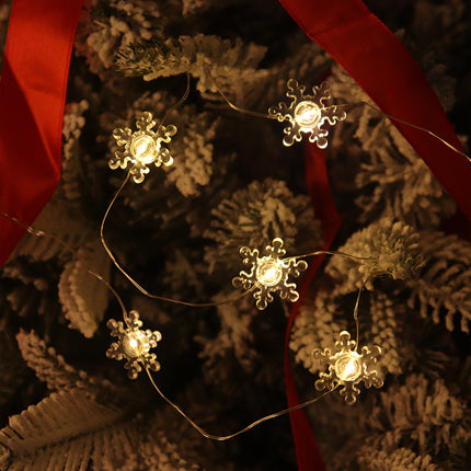 2m 20-LED Christmas Snowflake String Lights, Warm White, Battery Powered (2 x AA Batteries Required).