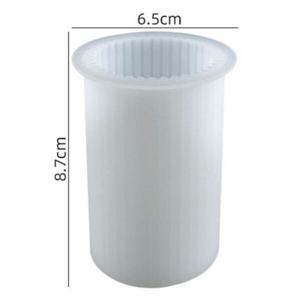 White Silicone Ribbed Candle Mold DIY for Halloween Candles.