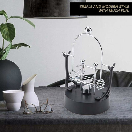 Electronic Perpetual Motion Shake Wiggle Device Swinging Balance Bicycle Physics Science Desk Toy.