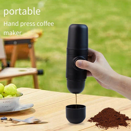 Portable manual coffee maker for travel – ideal for outdoor camping.