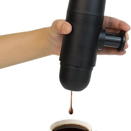 Portable manual coffee maker for travel – ideal for outdoor camping.