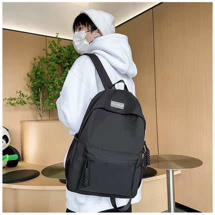 Waterproof School Backpack for Travel, Unisex Solid Color, Black.