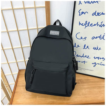 Waterproof School Backpack for Travel, Unisex Solid Color, Black.