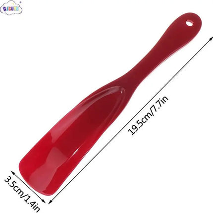 Spoon-shaped shoehorn | Plastic | Length 19.5 cm | Shoe puller | With hanging loop | Black.