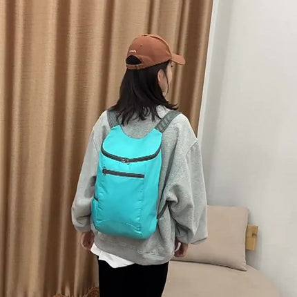 Foldable Lightweight Backpack | Backpack | Splashproof | 2 Compartments with Water Bottle Holder | Incl. Storage Pouch | 20 Liters | Black.