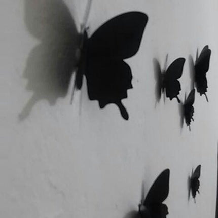 Solid black 3D butterflies.