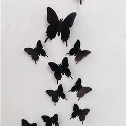 Solid black 3D butterflies.