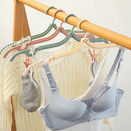 12 Pieces Clothes Hangers - Foldable Clothes Hangers - Anti-Slip - Coat Hangers - Trouser Hangers - Travel Clothes Hangers - Durable & Portable - Trackless - Plastic - Bedroom Organizers - Travel Accessories - Space-Saving Clothes Hangers.