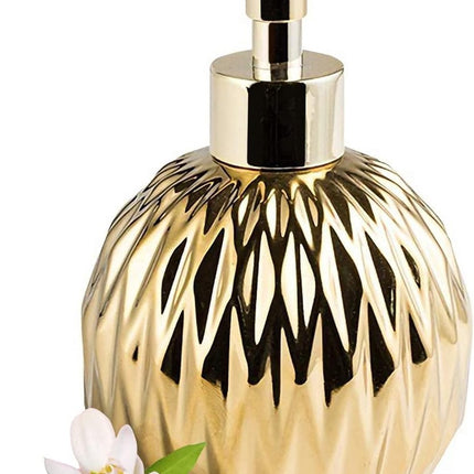 Modern ceramic soap dispenser gold for bathroom and kitchen.