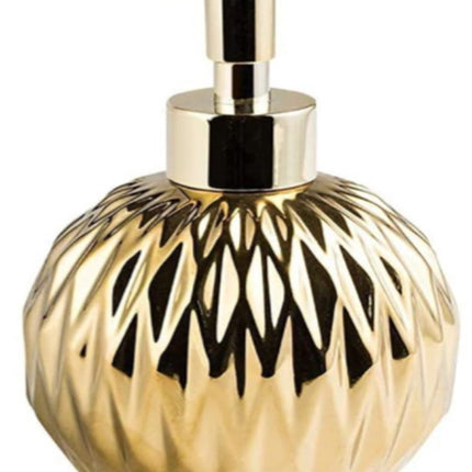 Modern ceramic soap dispenser gold for bathroom and kitchen.