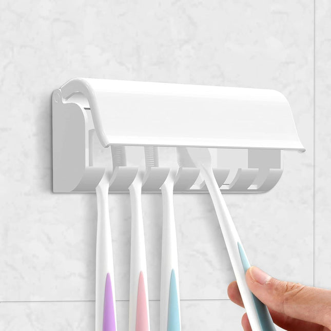 Wall-mounted toothbrush holder with 6 compartments and self-adhesive.