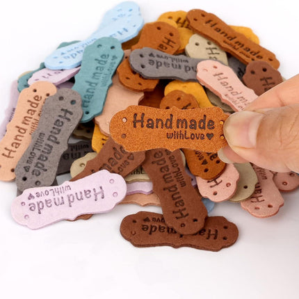 SAVITA 50 x Handmade Leather Labels with Microfibre Woven Leather Labels with Love Hearts for Crafts, Knitting, Handbags, Clothes (10 Colours).