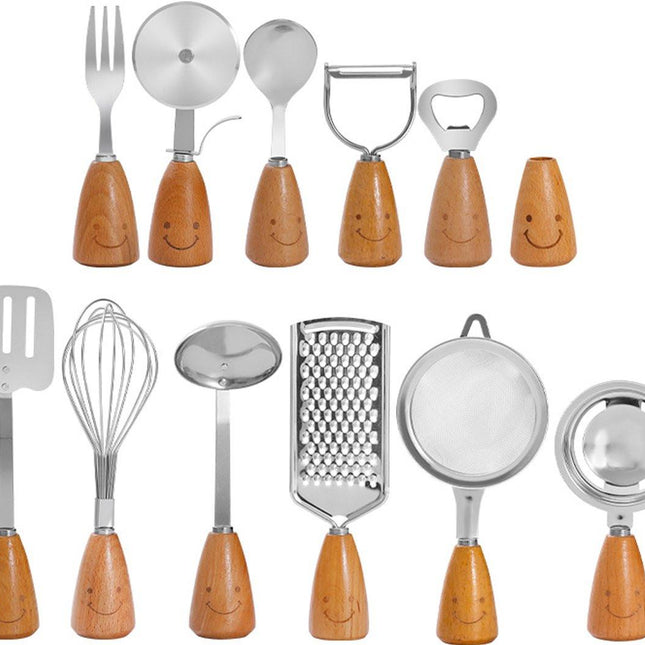 Kitchen Utensil Set - 12 Piece - Includes a peeler, egg separator, spoon, fork, pizza cutter, bottle opener, spatula, slotted spoon, grater, soup ladle, whisk and toothpick holder - The perfect gift for a housewife..