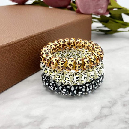 9-pack hair ties - Braided hair ties - Curly hair ties - Hair ties that can be worn as bracelets - Very elastic - Lightweight - Leopard print hair ties for phone cords.