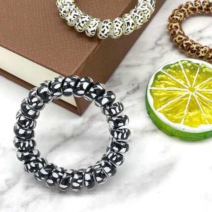 9-pack hair ties - Braided hair ties - Curly hair ties - Hair ties that can be worn as bracelets - Very elastic - Lightweight - Leopard print hair ties for phone cords.