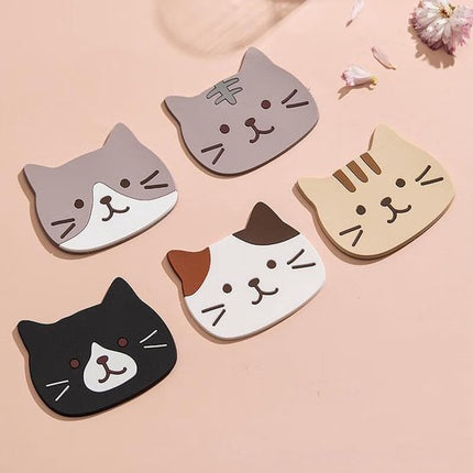 Coasters – Set of 5 – Cute cat design – Made of silicone – Compact, non-slip and heat resistant – Suitable for coffee tables, home use and cafes, also great as a gift for a housewarming or wedding..