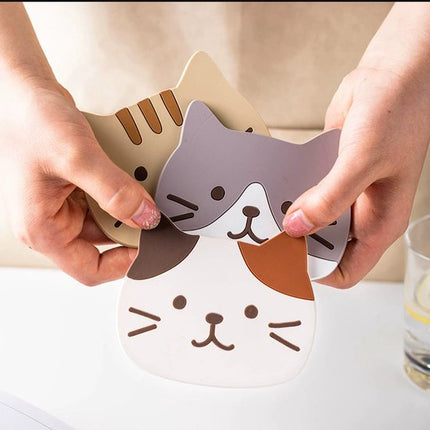 Coasters – Set of 5 – Cute cat design – Made of silicone – Compact, non-slip and heat resistant – Suitable for coffee tables, home use and cafes, also great as a gift for a housewarming or wedding..