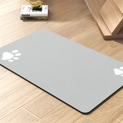Dog and Cat Feeding Mats - Non-Slip, Super Absorbent Pet Bowl Mat with Footprint Logo - 24 x 16.9 Inches - Brown.
