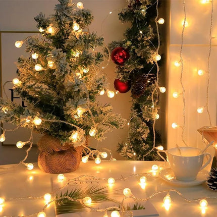 LED string lights with balls - battery operated - suitable for family gatherings, patios, gardens and weddings (6 m, 40 LEDs, warm color).
