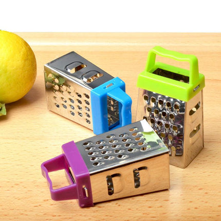 Mini cheese grater - Four-sided grater - Stainless steel slicer - Multifunctional vegetable cutter - Kitchen gadget - Lemon zester - A green.