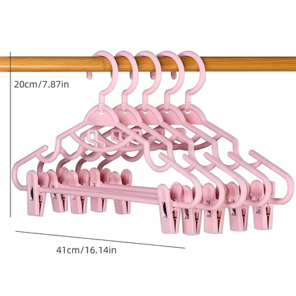 JSCDRPDWL Plastic Pants Hangers with Clips 5 Pack Heavy Duty Skirt Hangers Swivel Hook and Notches Space Saving Acrylic Clip Hangers for Pants Suitable for All Clothing White.