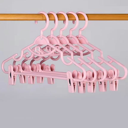 JSCDRPDWL Plastic Pants Hangers with Clips 5 Pack Heavy Duty Skirt Hangers Swivel Hook and Notches Space Saving Acrylic Clip Hangers for Pants Suitable for All Clothing White.