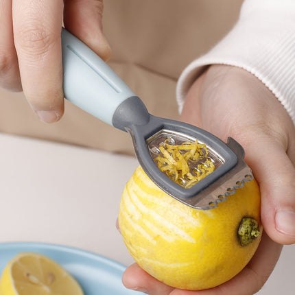 Green Stainless Steel 3-in-1 Citrus Zester & Juicer – Multi-Functional Lemon Grater, Peeler & Juicing Tool with Soft Grip Handle for Oranges, Limes & Grapefruit.