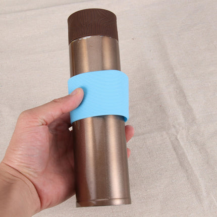Worgeous 4pcs Silicone Heat resistant Cup Sleeves Non slip Protective Water Glass Covers for Bottles and Mugs (Green Light Blue Pink Yellow).